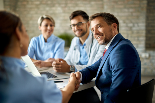 Businessman shaking hands with a business partner in a meeting