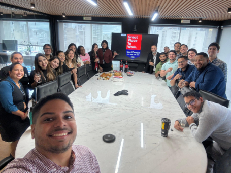 Group photo of Kraemer & Kraemer team toasting to their 2024-2025 Great Place to Work® recognition.