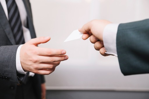 Man signing a contract negotiation