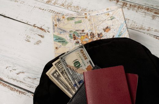 Background map with a passport with money, representing CBI